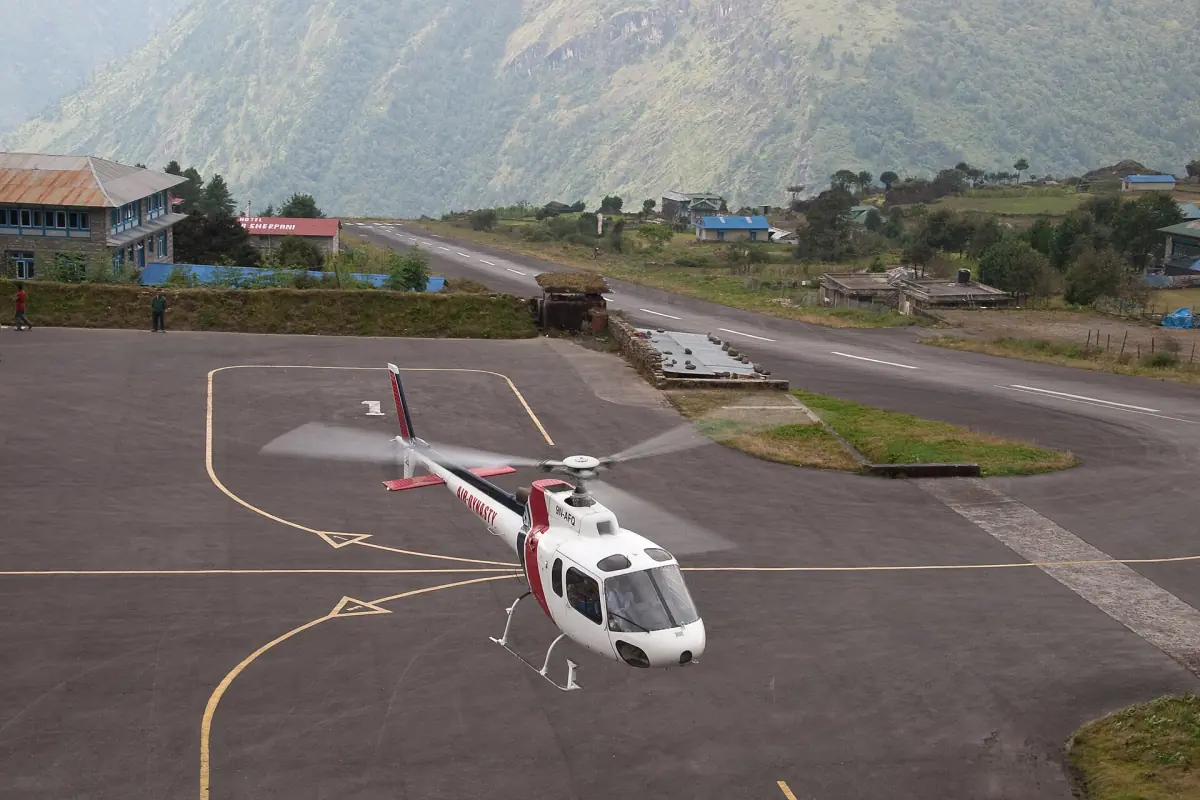 A helicopter on the apron at Lukla